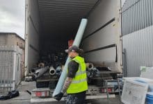 Collecting a roll of flooring for reuse